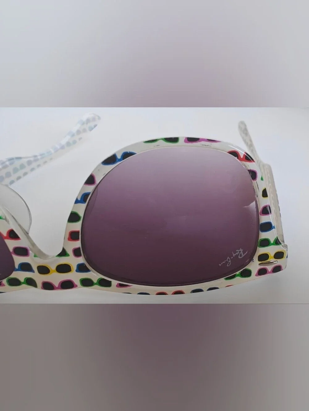 Ray-Ban Wayfarer Special Series #4 white frame covered in colorful sunglasses